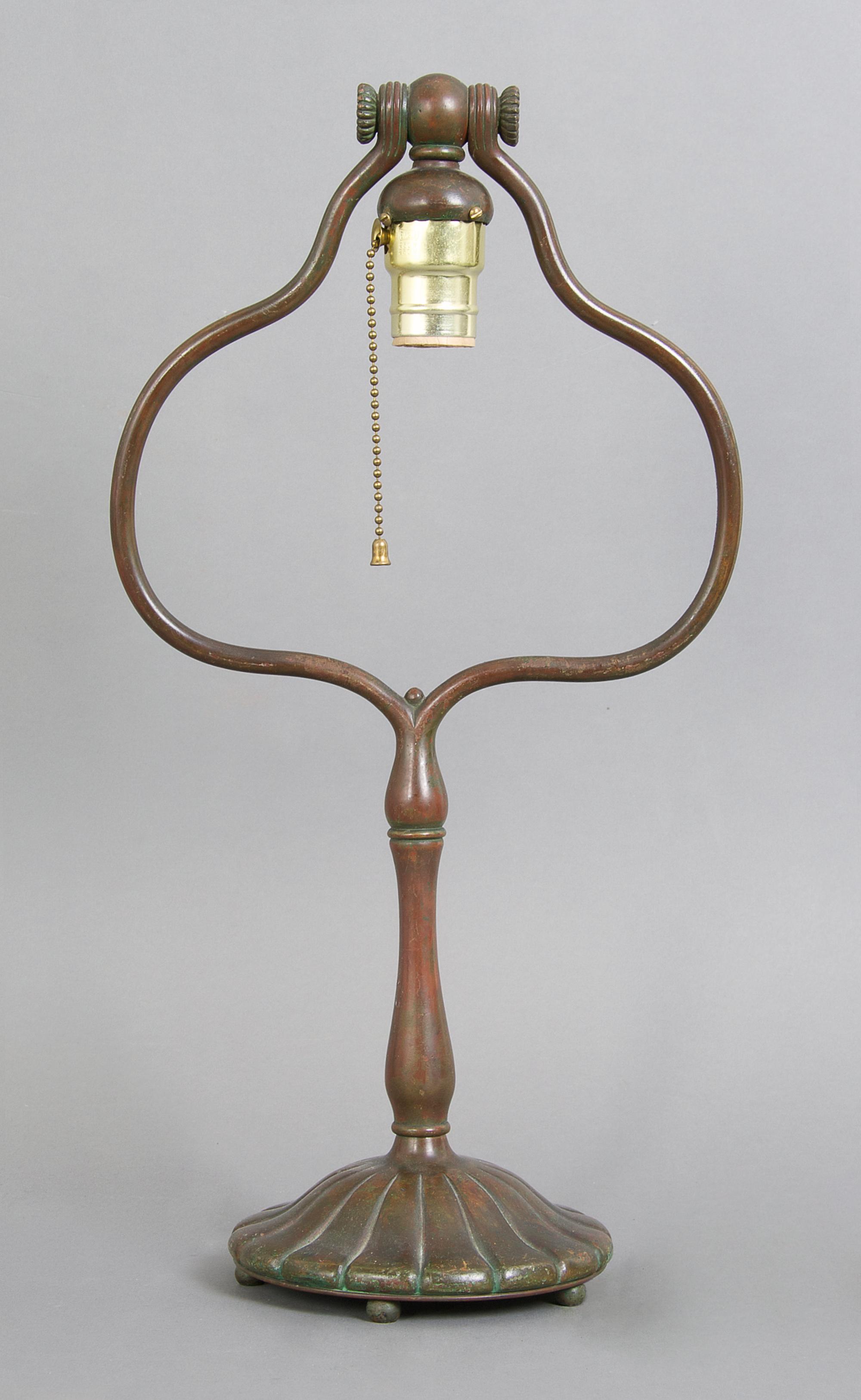 A Tiffany Studios Bronze Harp Lamp Base, Height 17 3/4 inches.