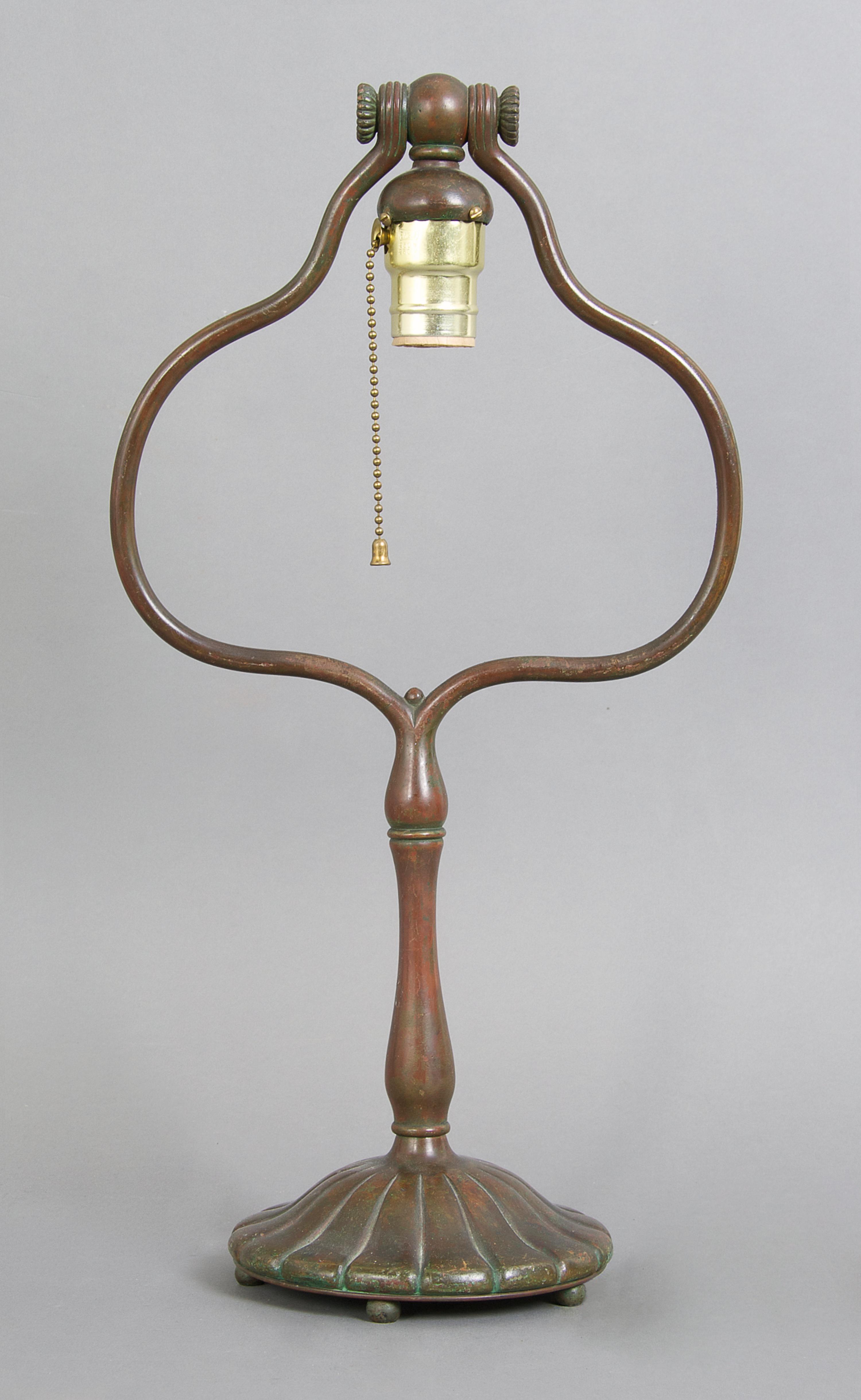 A Tiffany Studios Bronze Harp Lamp Base, Height 17 3/4 inches.