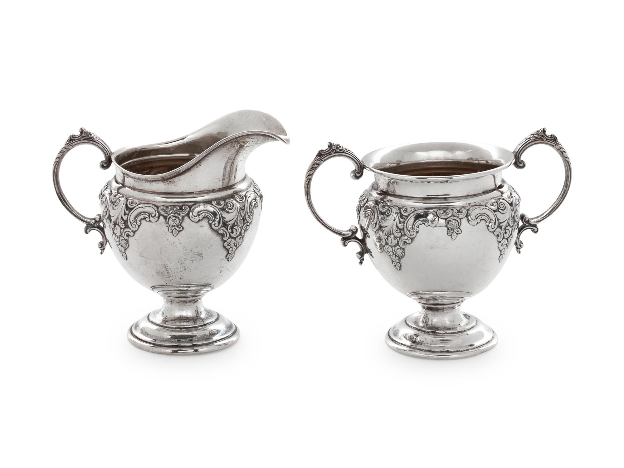 embossed with scrolls and flowers.