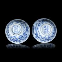 A Pair of Blue and White 'Phoenix' Cups, Jiajing Mark, 16th/17th Century 明晚期 嘉靖款青花穿花鳳紋杯一對