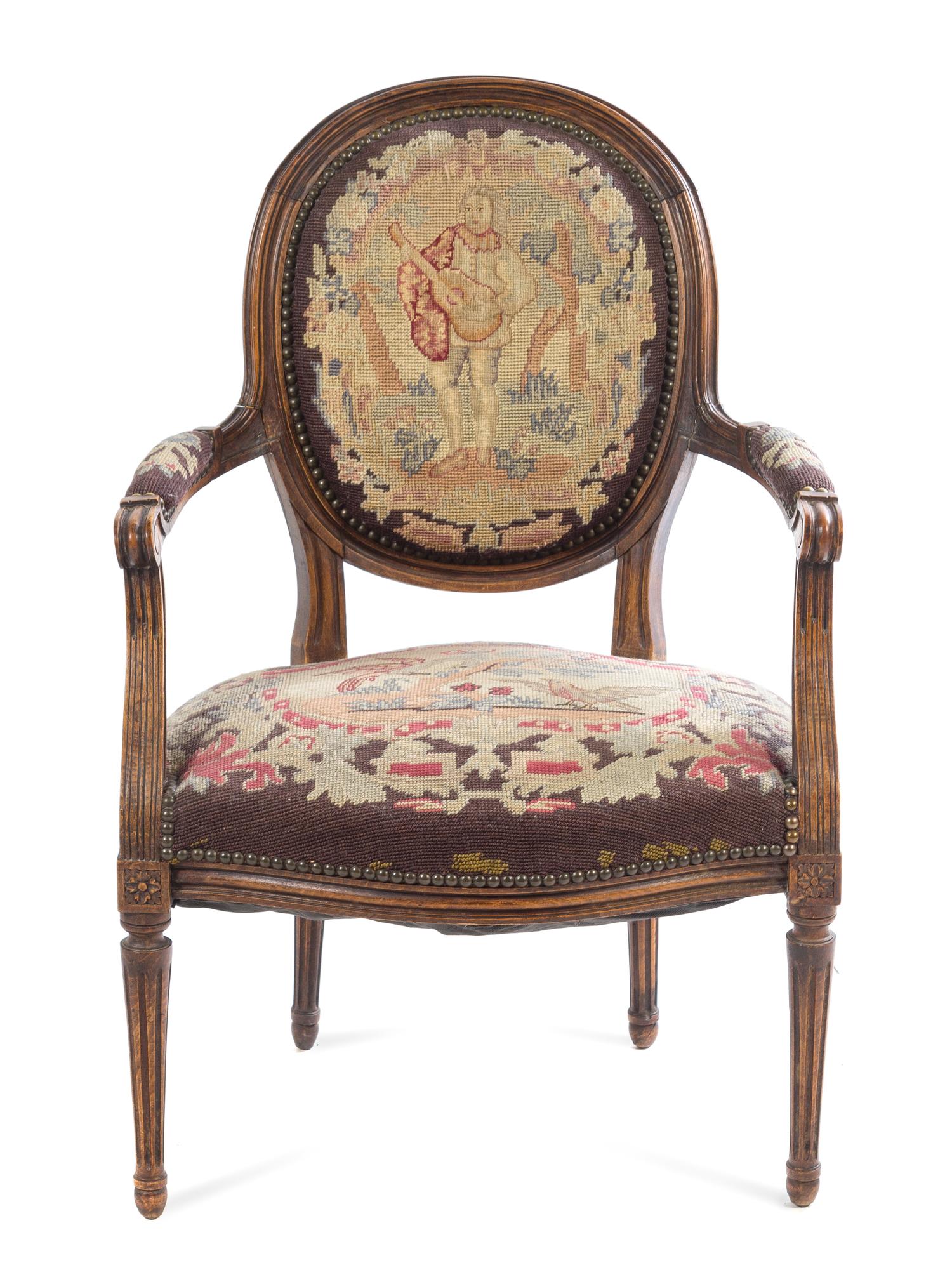 A French Carved Walnut Fauteuil Height 34 1/2 inches. — 19TH CENTURY