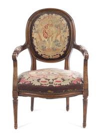 A French Carved Walnut Fauteuil Height 34 1/2 inches. — 19TH CENTURY