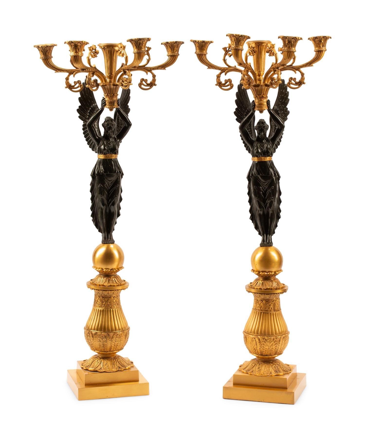 A Pair of Empire Style Gilt and Patinated Bronze Five-Light Candelabra