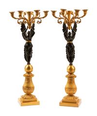 A Pair of Empire Style Gilt and Patinated Bronze Five-Light Candelabra