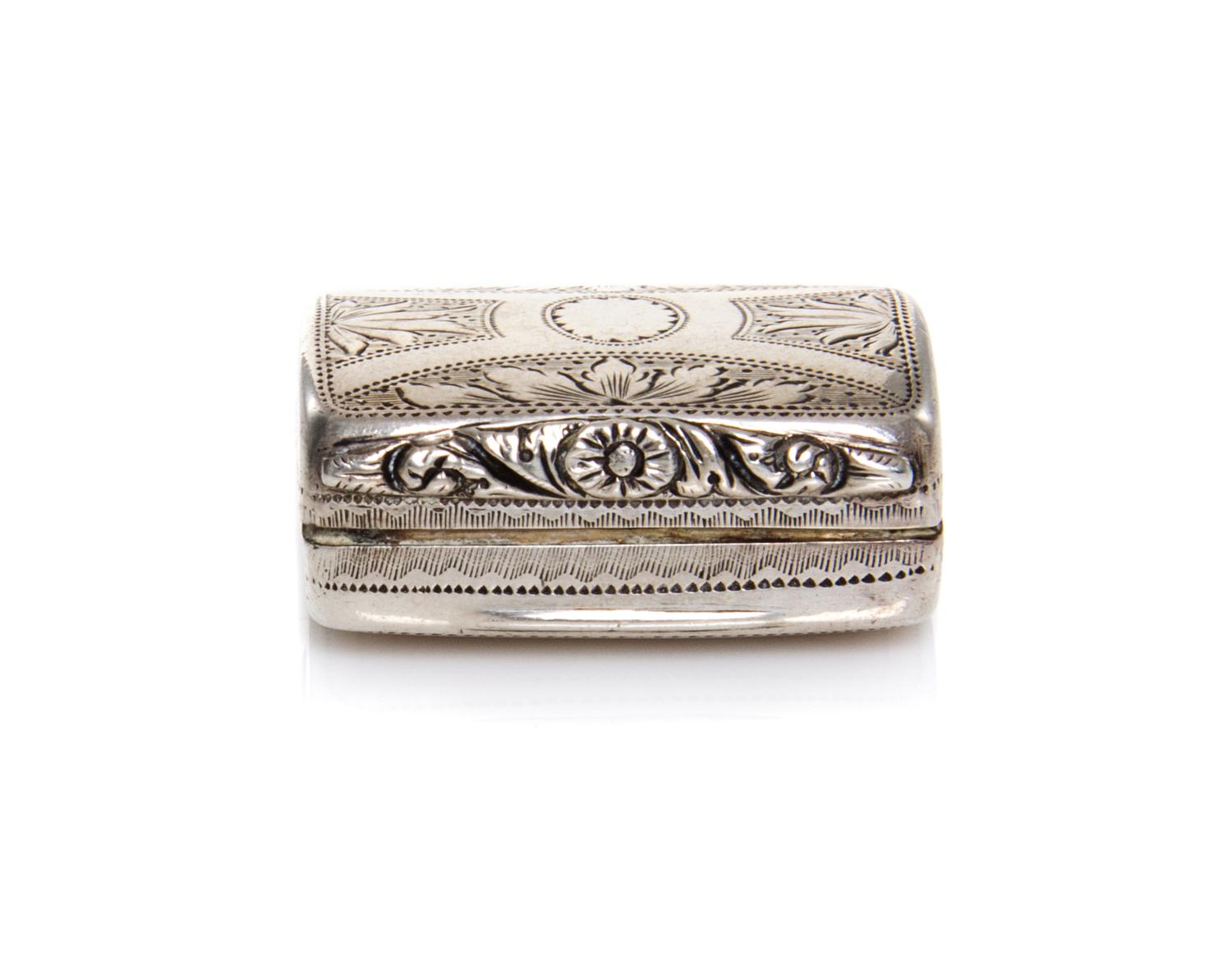 A George IV Silver Vinaigrette, Joseph Taylor, Birmingham, 1825, of rectangular, hinged form with foliate decoration.