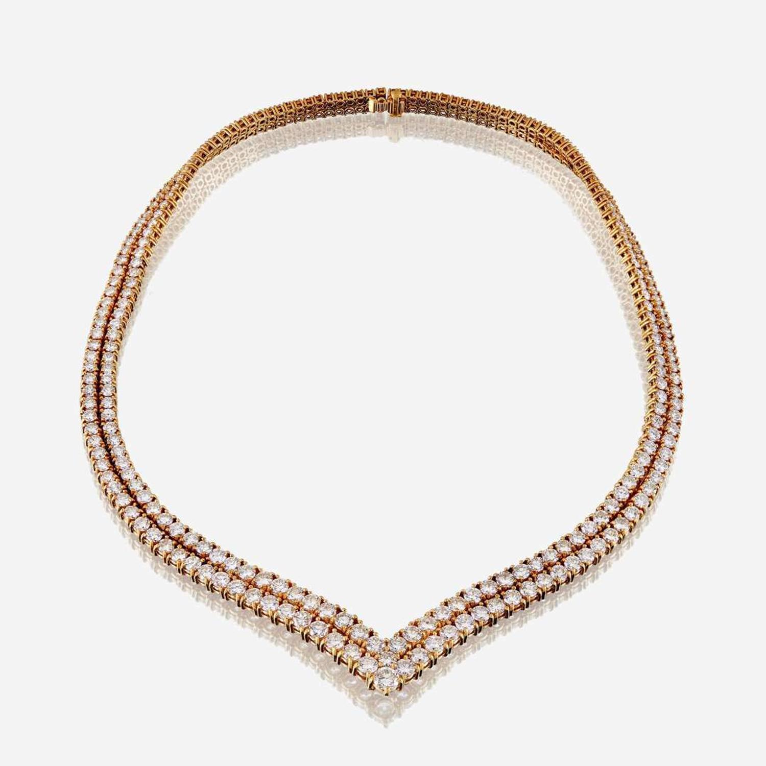 A diamond and eighteen karat gold necklace