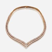 A diamond and eighteen karat gold necklace