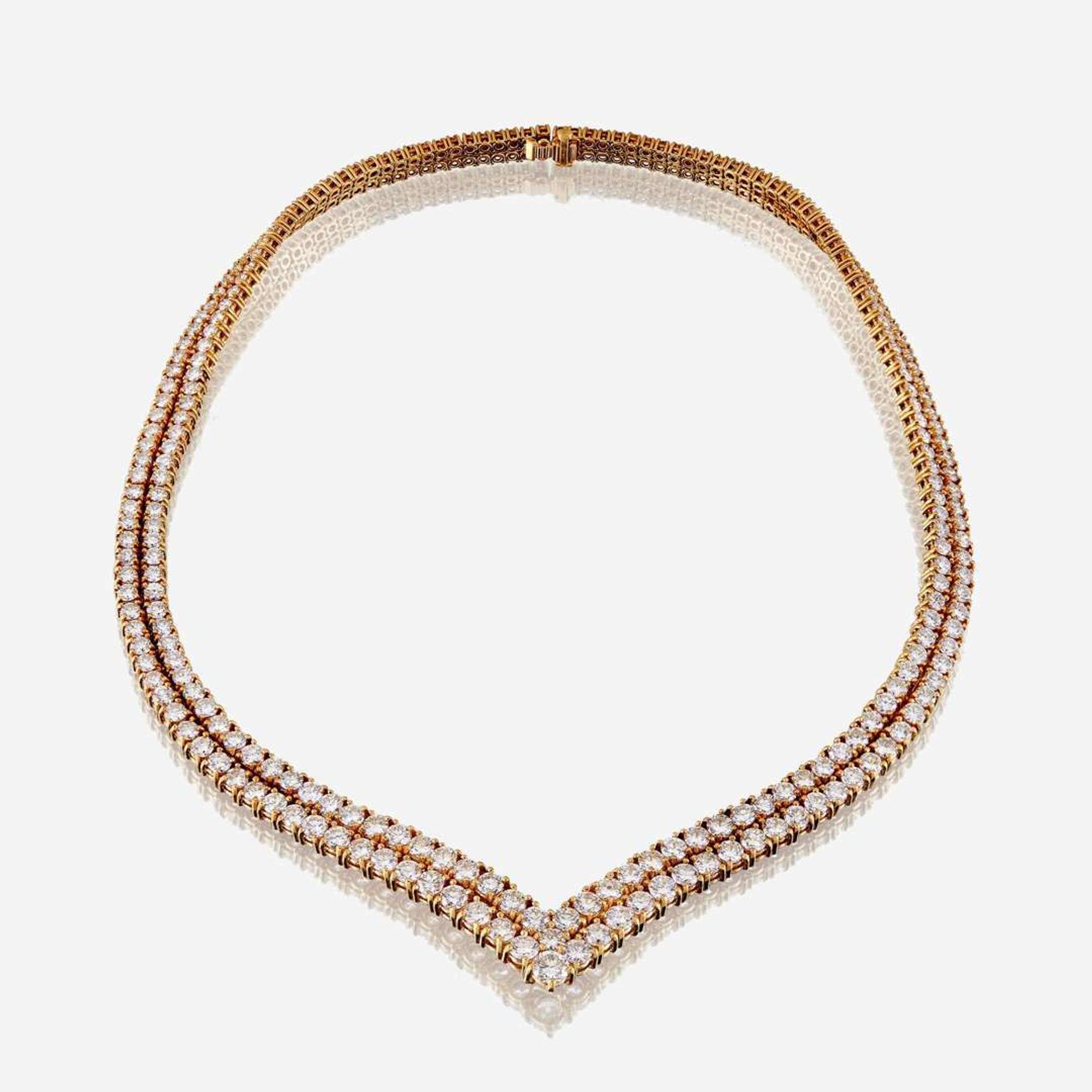 A diamond and eighteen karat gold necklace