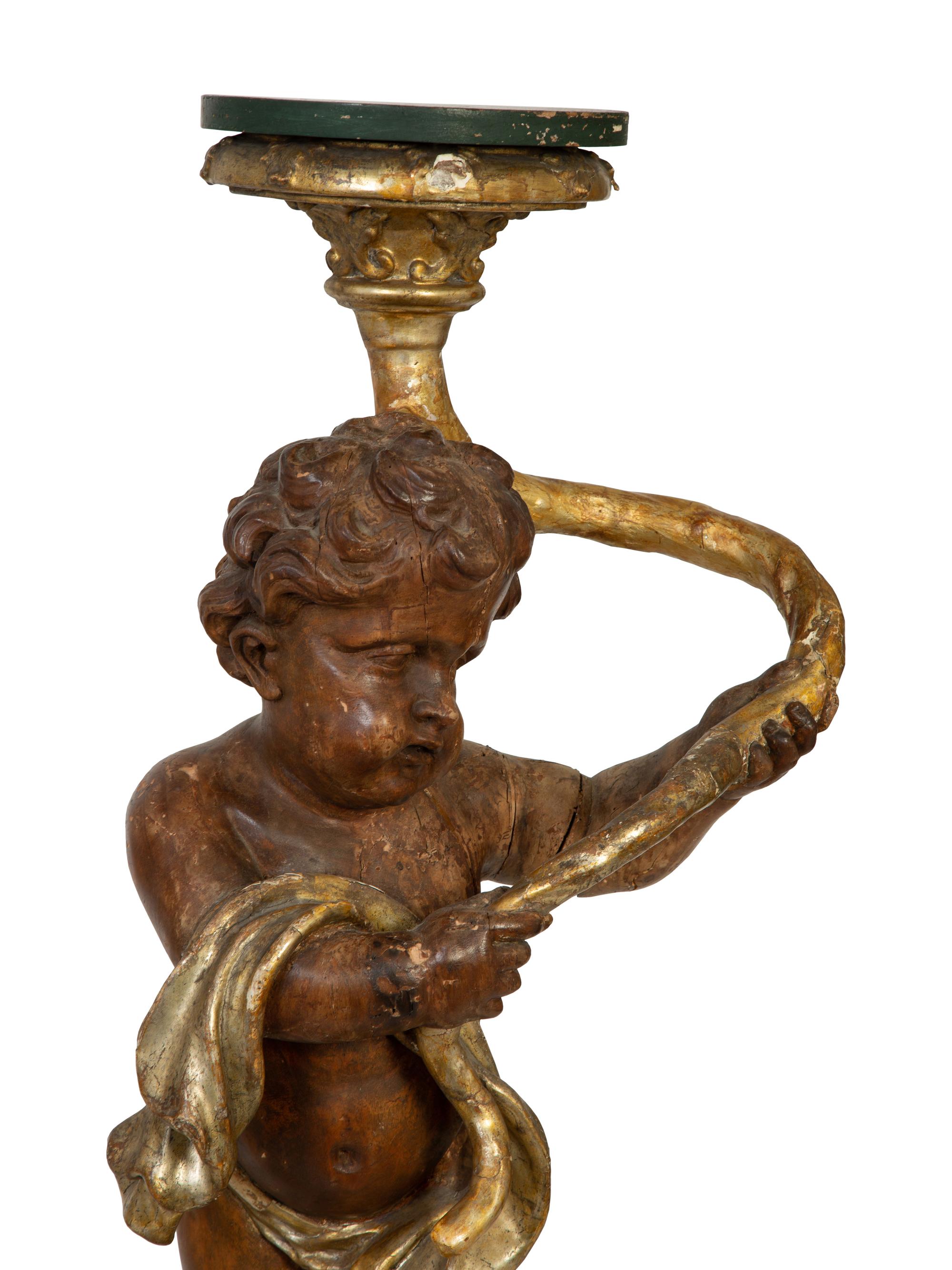 A Pair of Italian Painted and Parcel Gilt Figural Torcheres — 18TH CENTURY