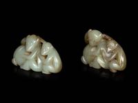 Two Chinese Celadon and Russet Jade Carved Figures of Monkeys