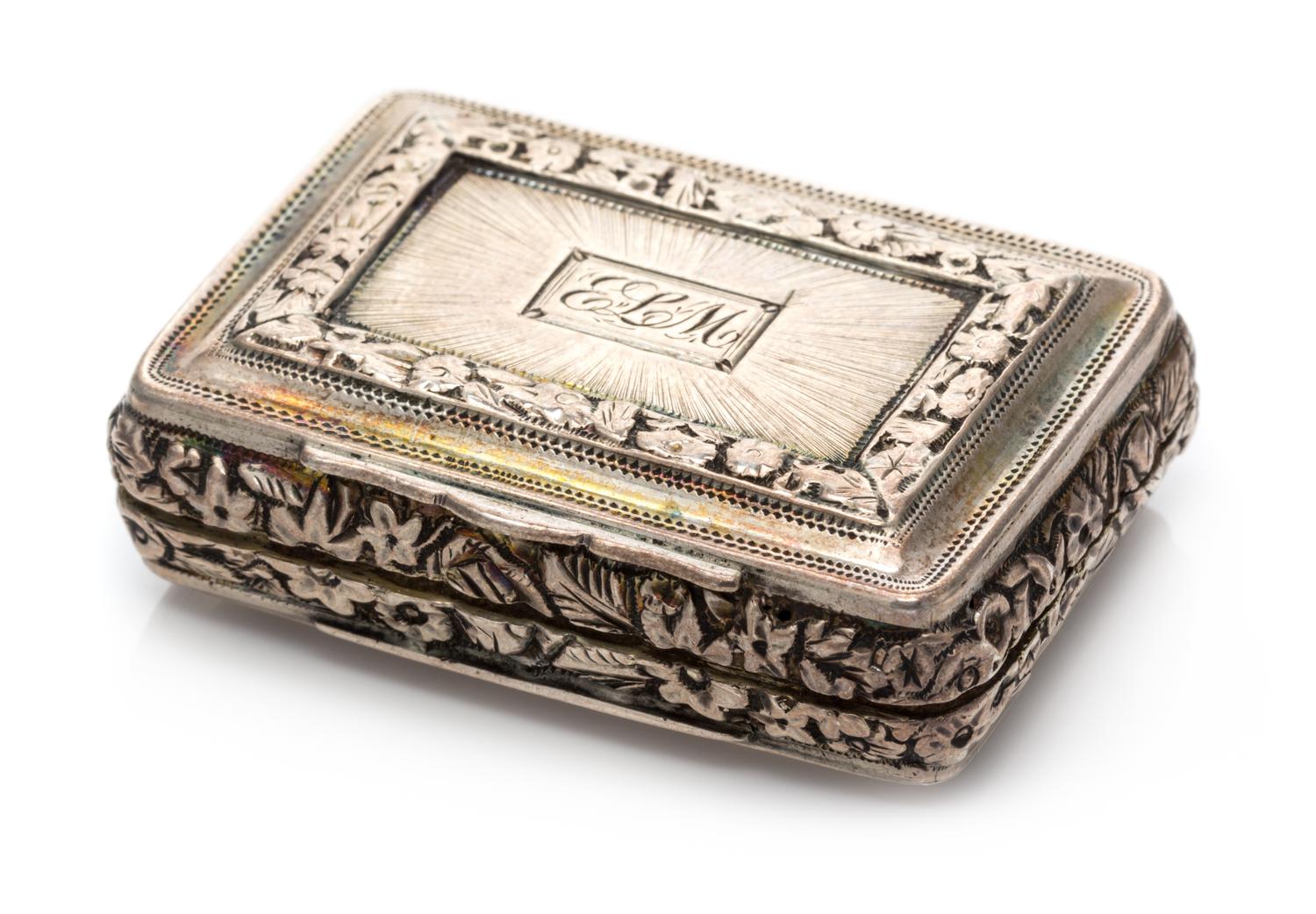 A George III Silver Vinaigrette, Joseph Willmore, Birmingham, 1817, the lid centered by a monogrammed cartouche with sunburst decoratio