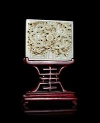 A White Jade Reticulated 'Dragon' Belt Plaque