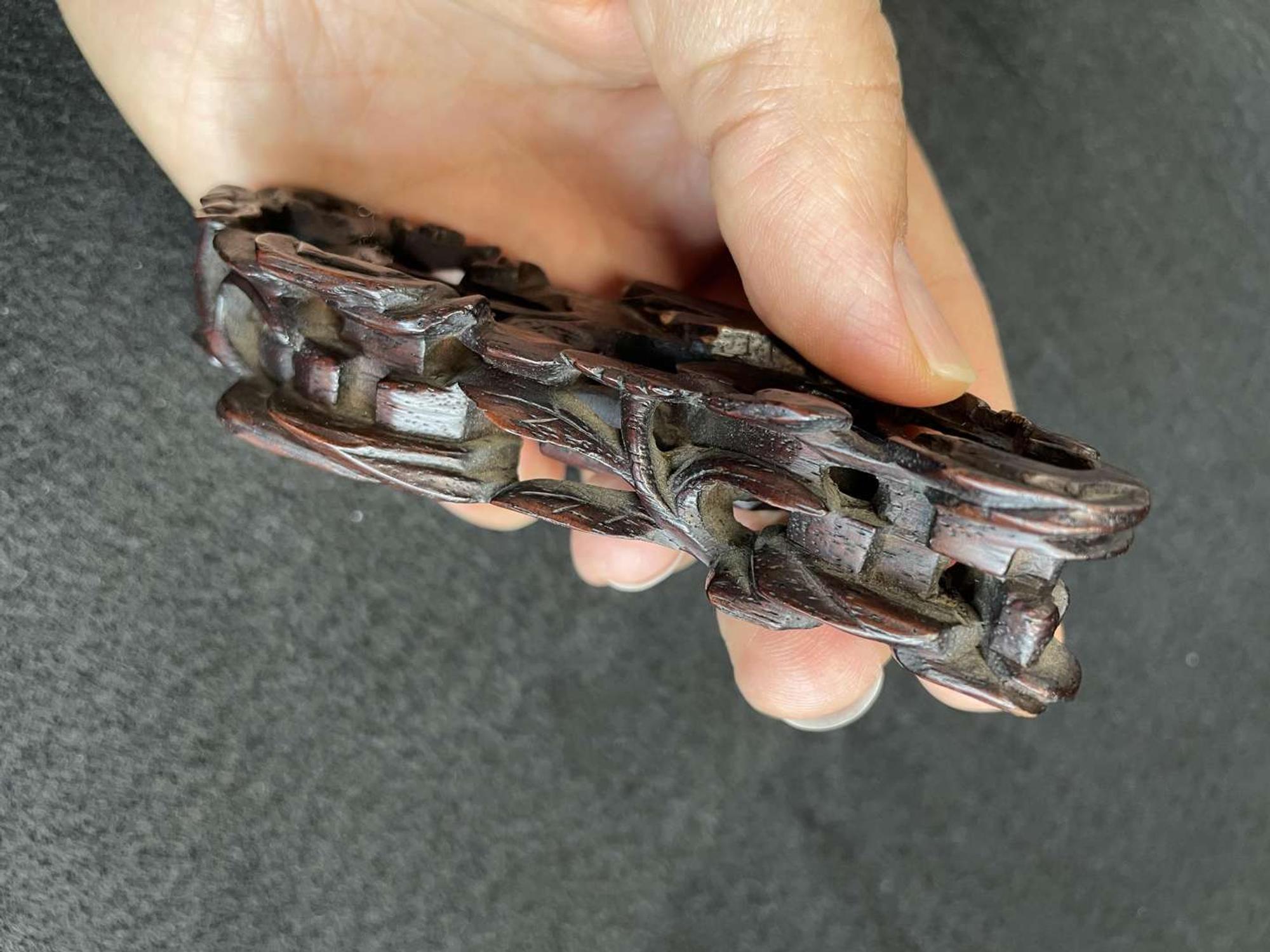 A Chinese jade "Boys, Kylin and Phoenix" vase on carved wood stand 玉雕童子凤鸟花樽及底座
