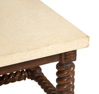 A Jacobean Style Low Table with Later Limestone Top