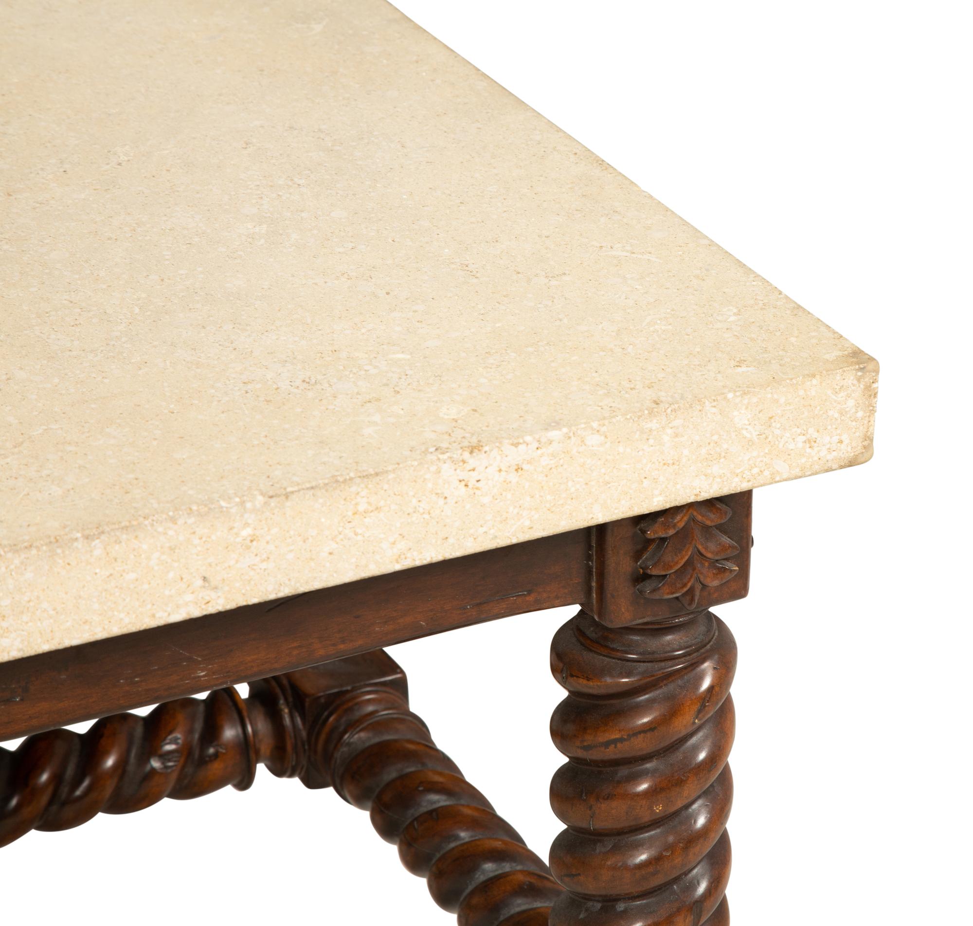 A Jacobean Style Low Table with Later Limestone Top