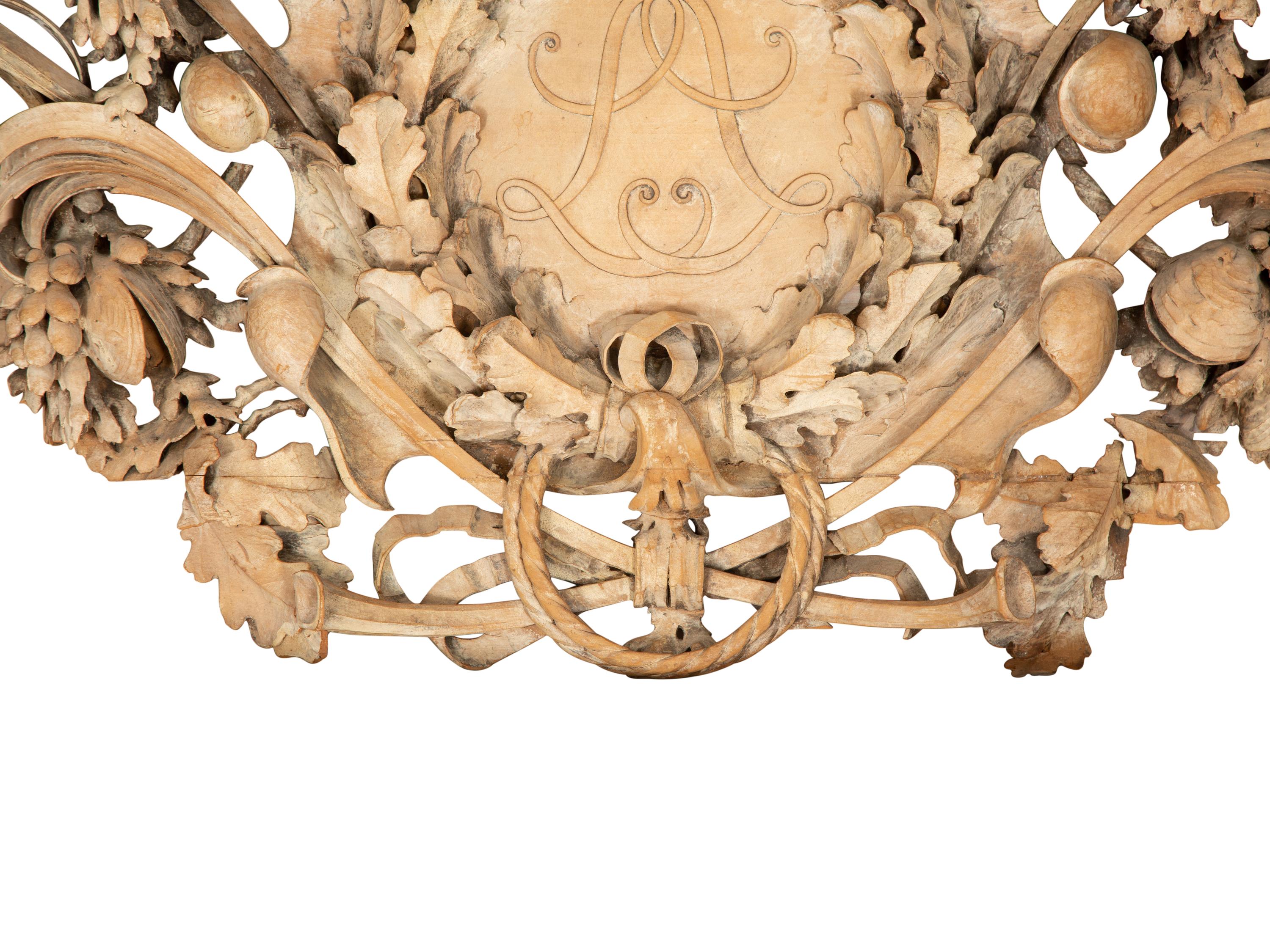 A French Carved Limewood Overdoor Panel Carved with Fruit, Flowers and Seashells