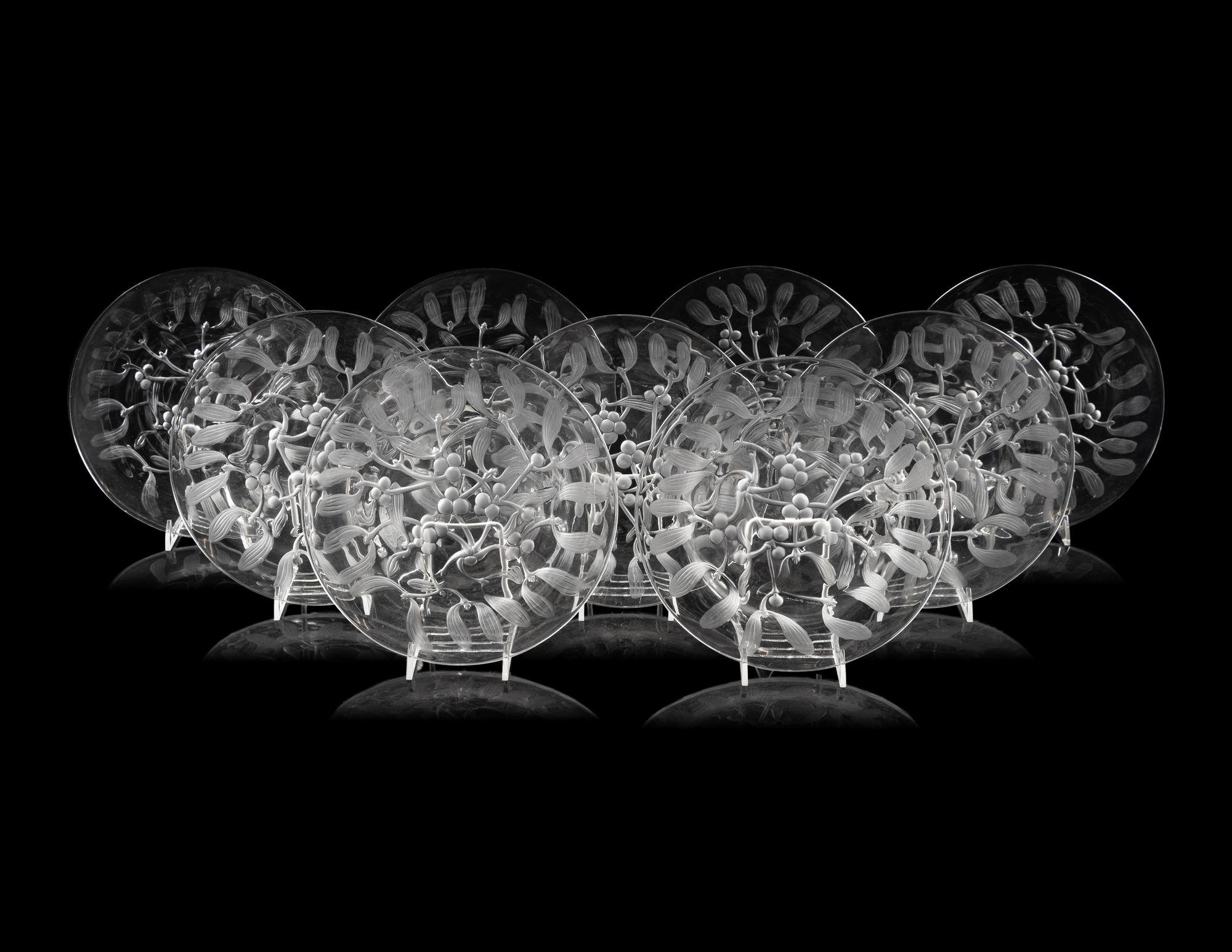 A Set of Eight Lalique Saint Sylvestre Plates