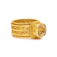 HIGH KARAT GOLD AND YELLOW SAPPHIRE RING