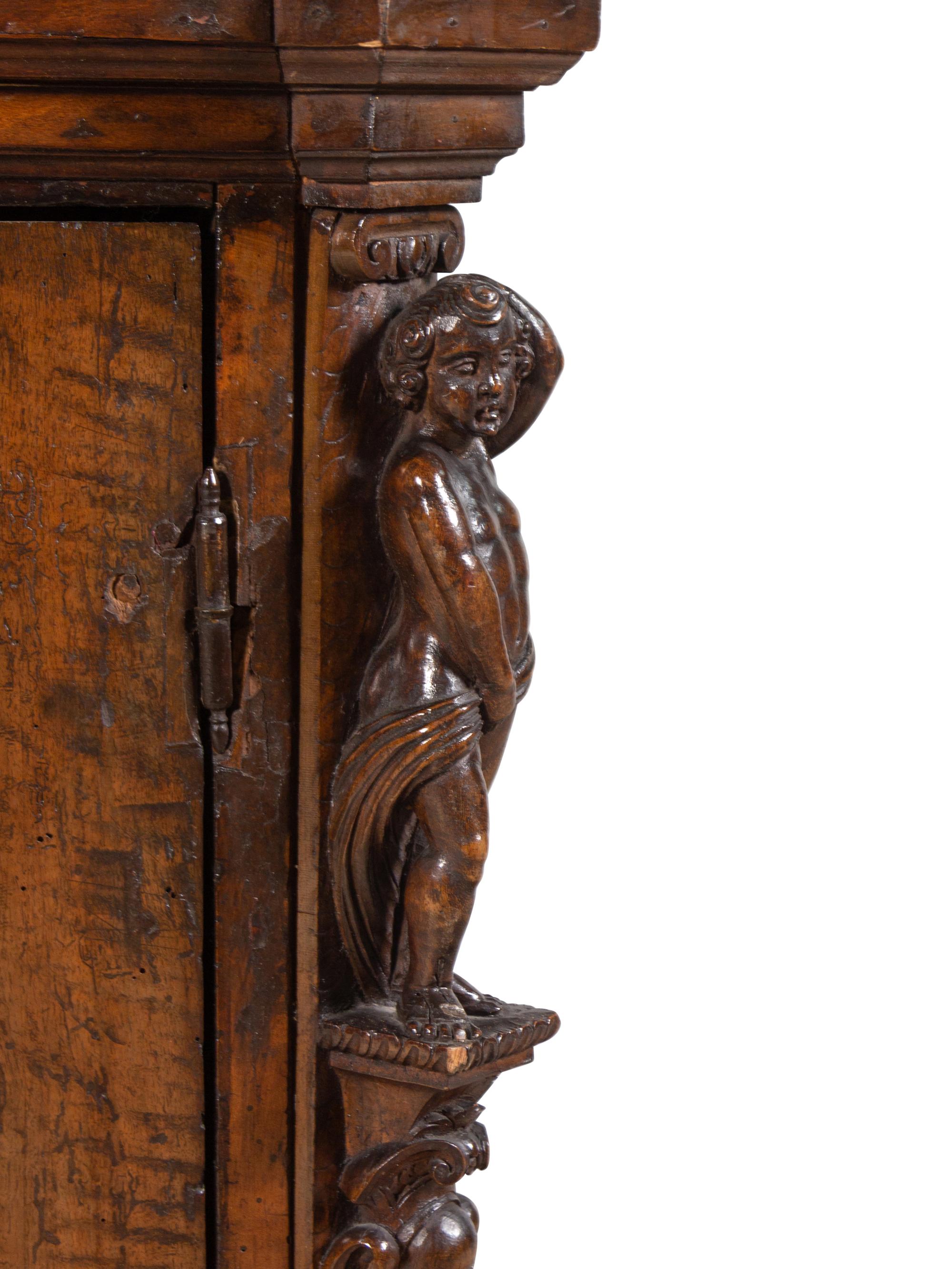 An Italian Baroque Walnut Serving Cabinet