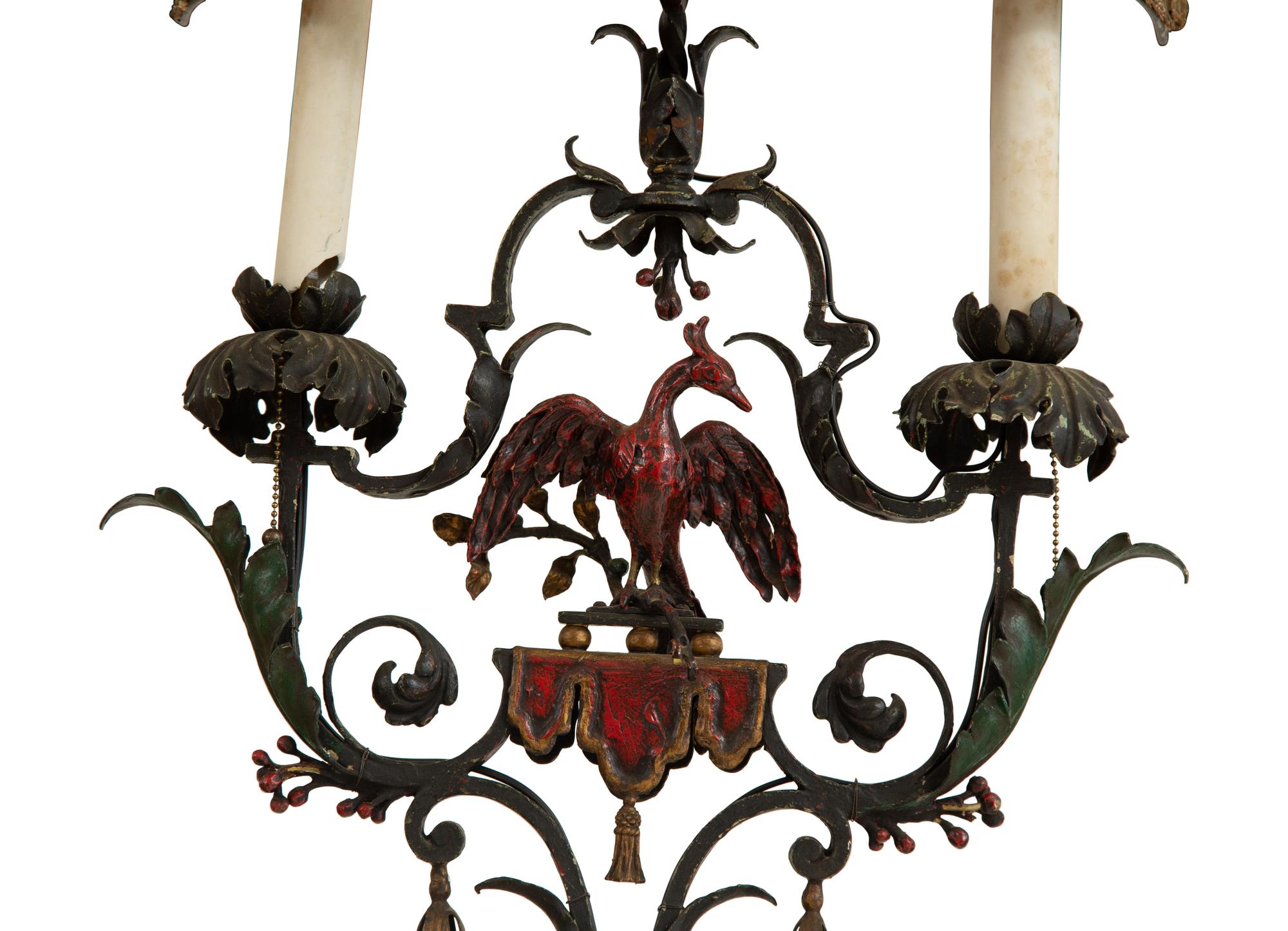 A Mizner Style Painted and Parcel Gilt Wrought Iron Four-Light Torchère with Polychromed Leather Shade