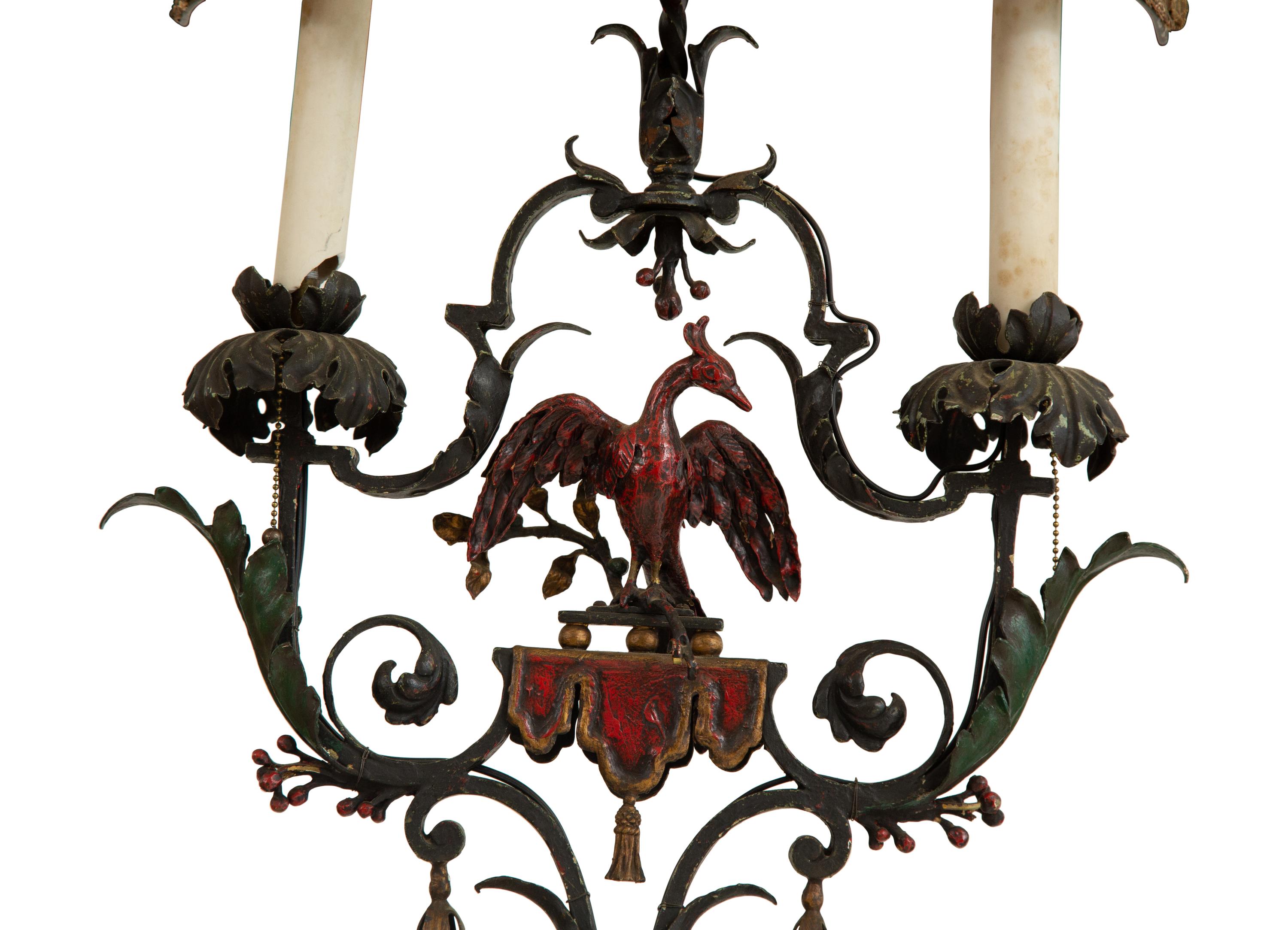 A Mizner Style Painted and Parcel Gilt Wrought Iron Four-Light Torchère with Polychromed Leather Shade