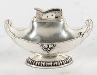 A Silver-Plate Table Lighter Height 2 1/2 x width 4 1/4 inches.