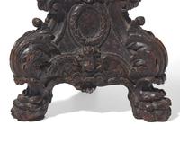 A large Italian Baroque carved walnut pricket candlestick, 16th century