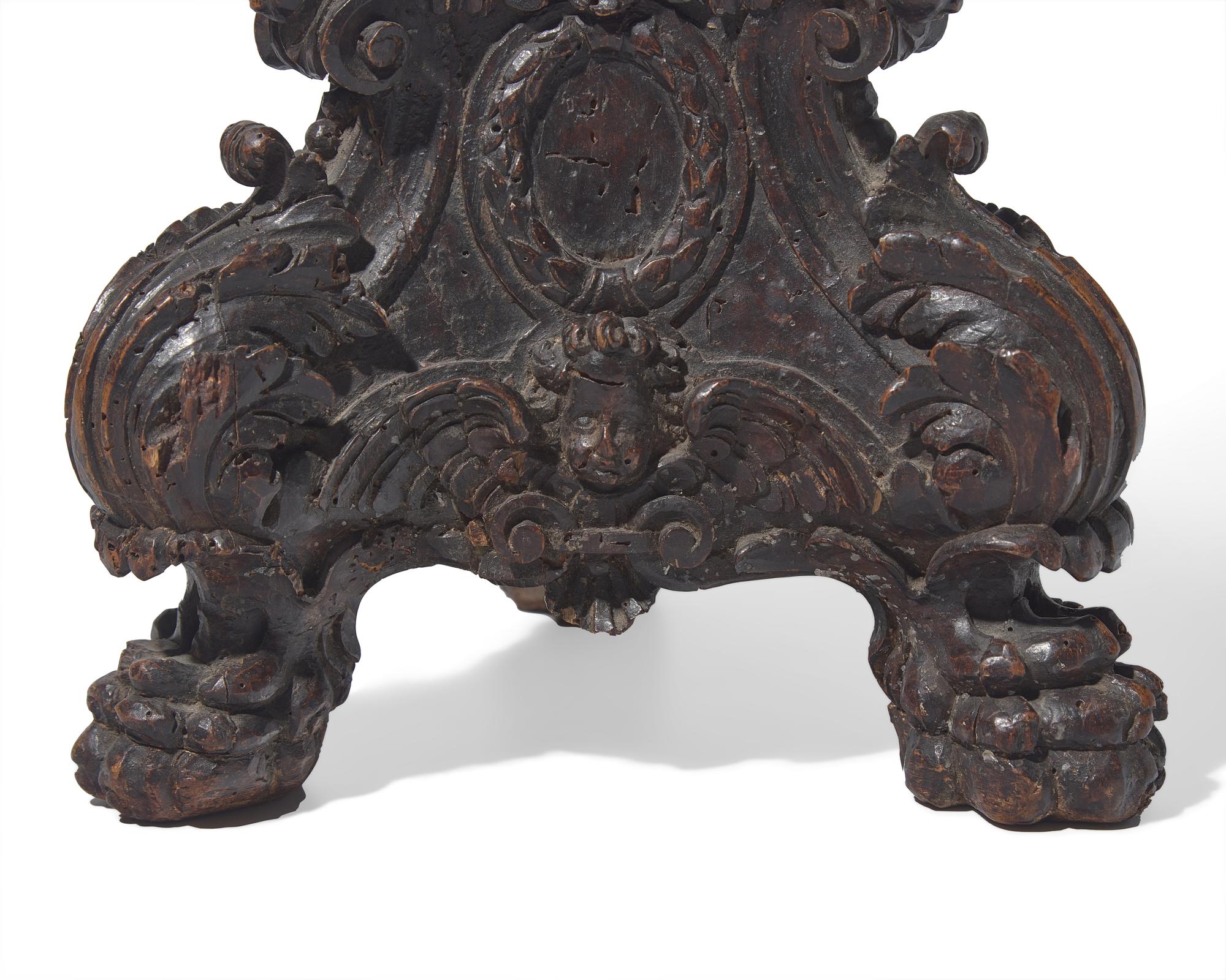 A large Italian Baroque carved walnut pricket candlestick, 16th century