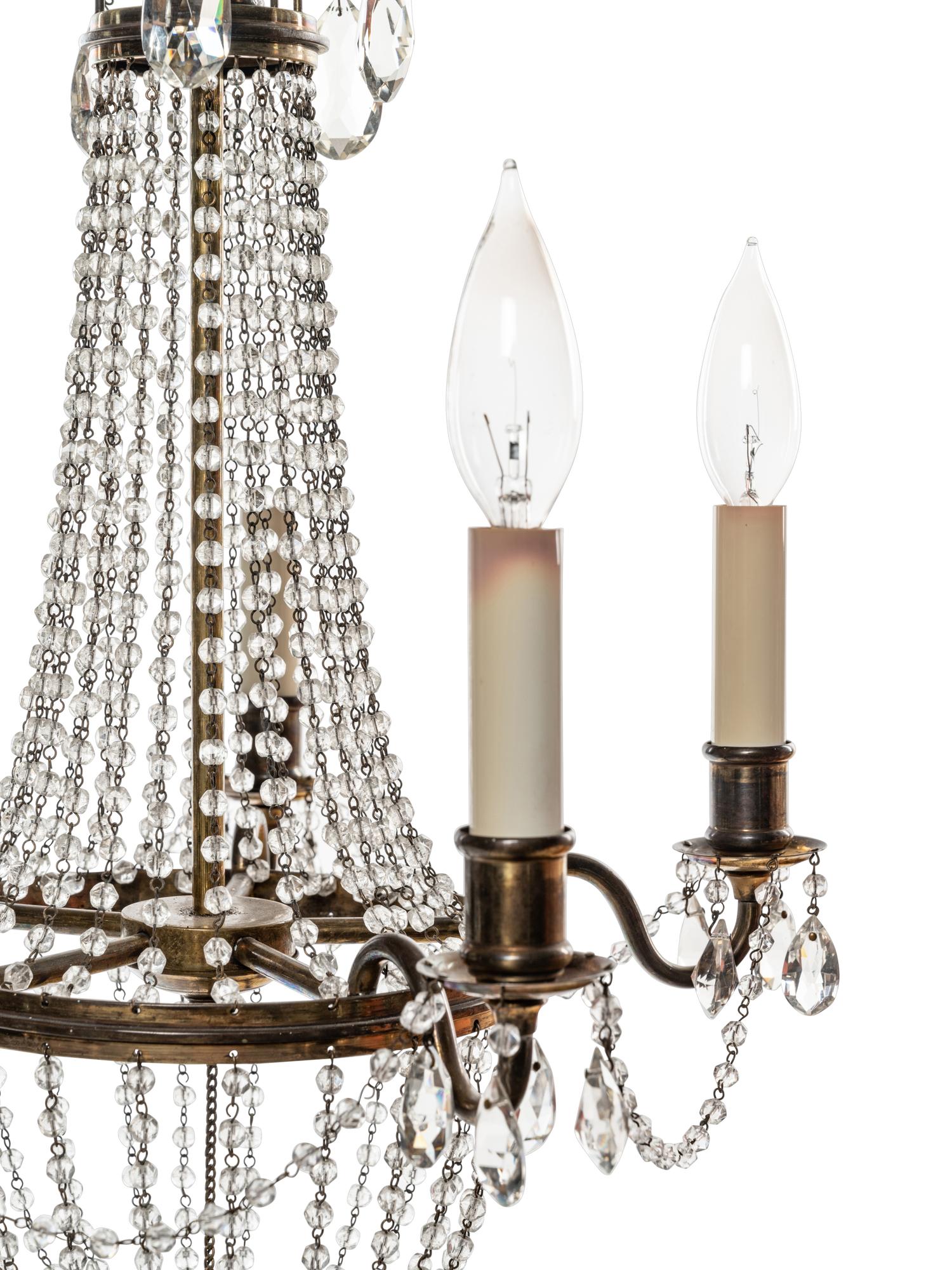 An Empire Style Brass and Cut Glass Five-Light Chandelier