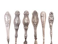 A Group of Sixteen American and Mexican Silver Table Articles