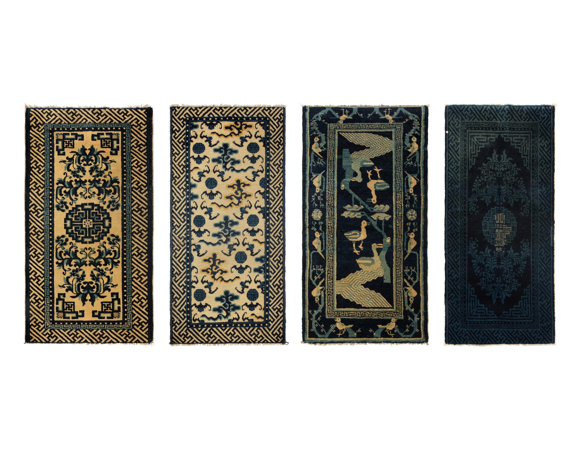 A Group of Four Chinese Rugs