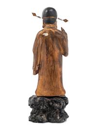 A Chinese Gilt Decorated Wood Figure of a Standing Official