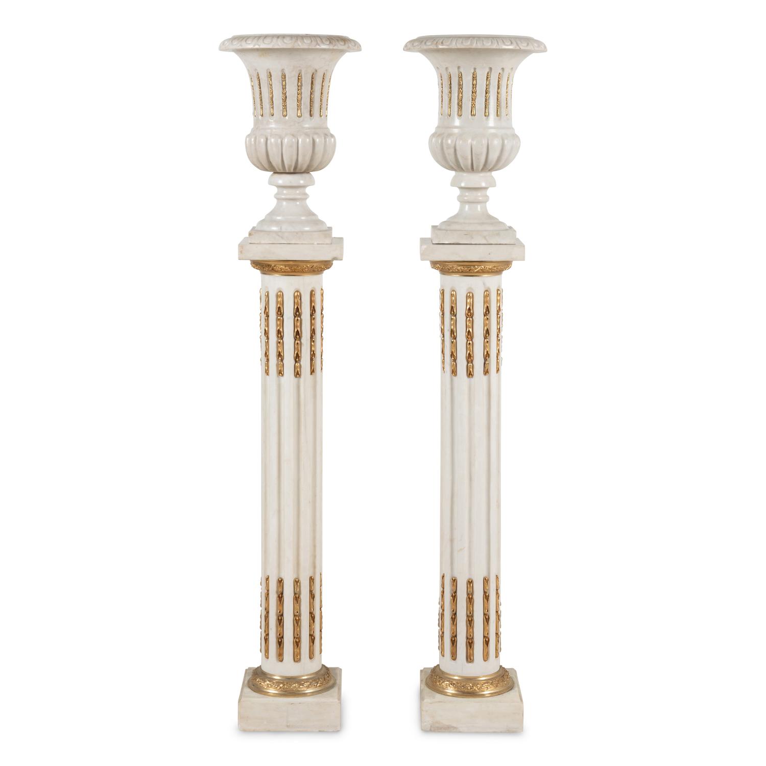 A Pair of Neoclassical Style Gilt Bronze Mounted Marble Urns on Pedestals