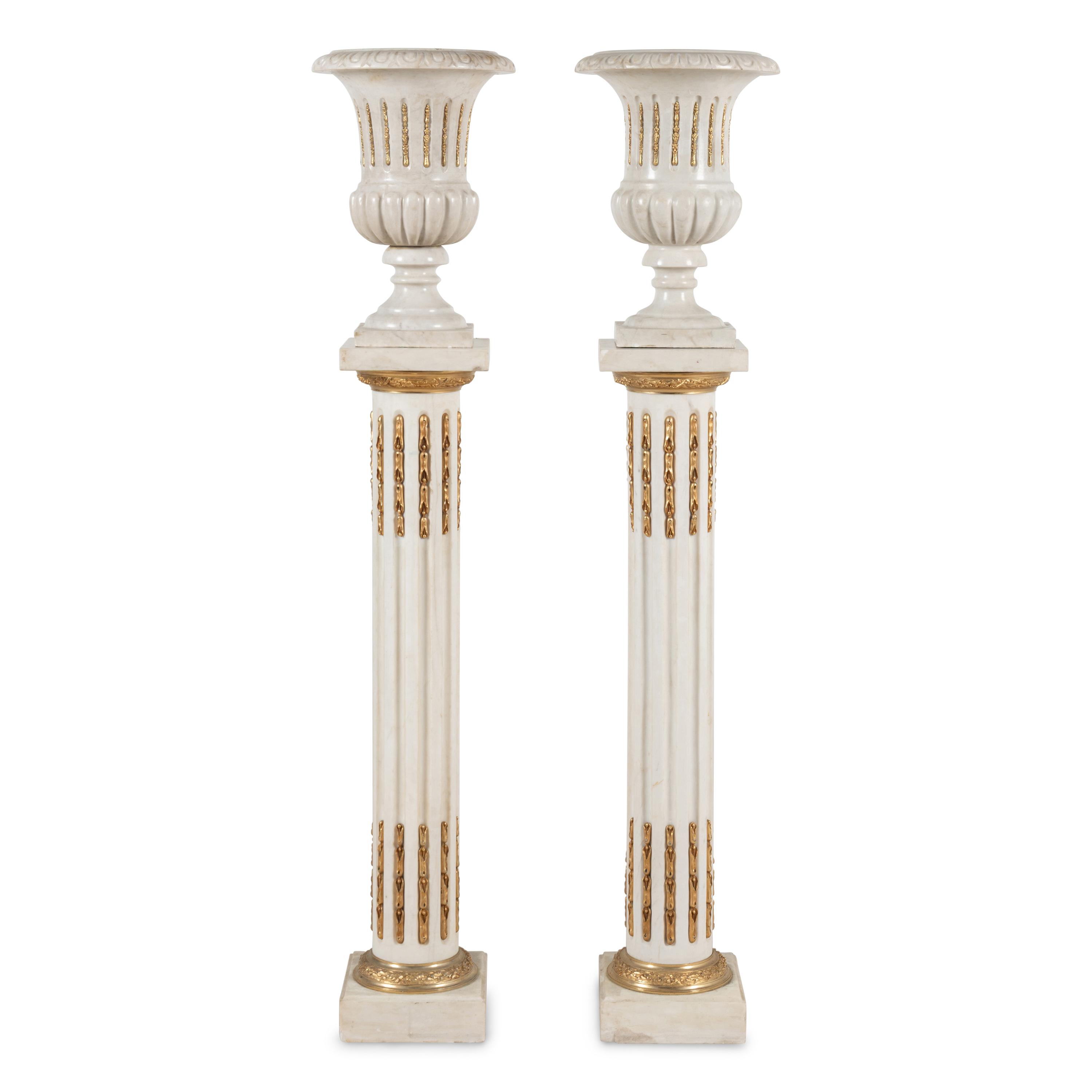 A Pair of Neoclassical Style Gilt Bronze Mounted Marble Urns on Pedestals