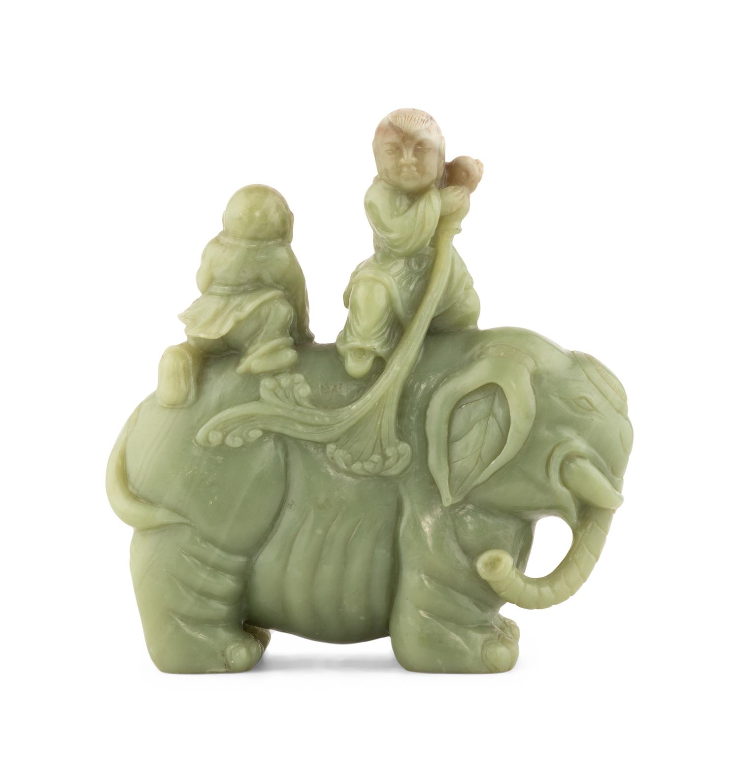 A Chinese Celadon Jade Figural Group of Boys Riding an Elephant