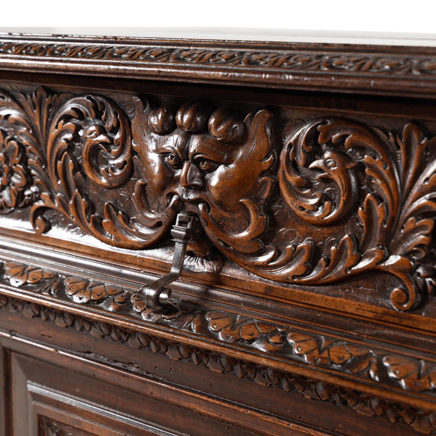 An Italian Baroque Style Carved Walnut Console Cabinet