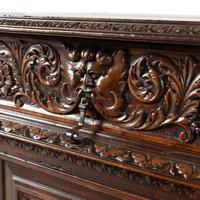 An Italian Baroque Style Carved Walnut Console Cabinet