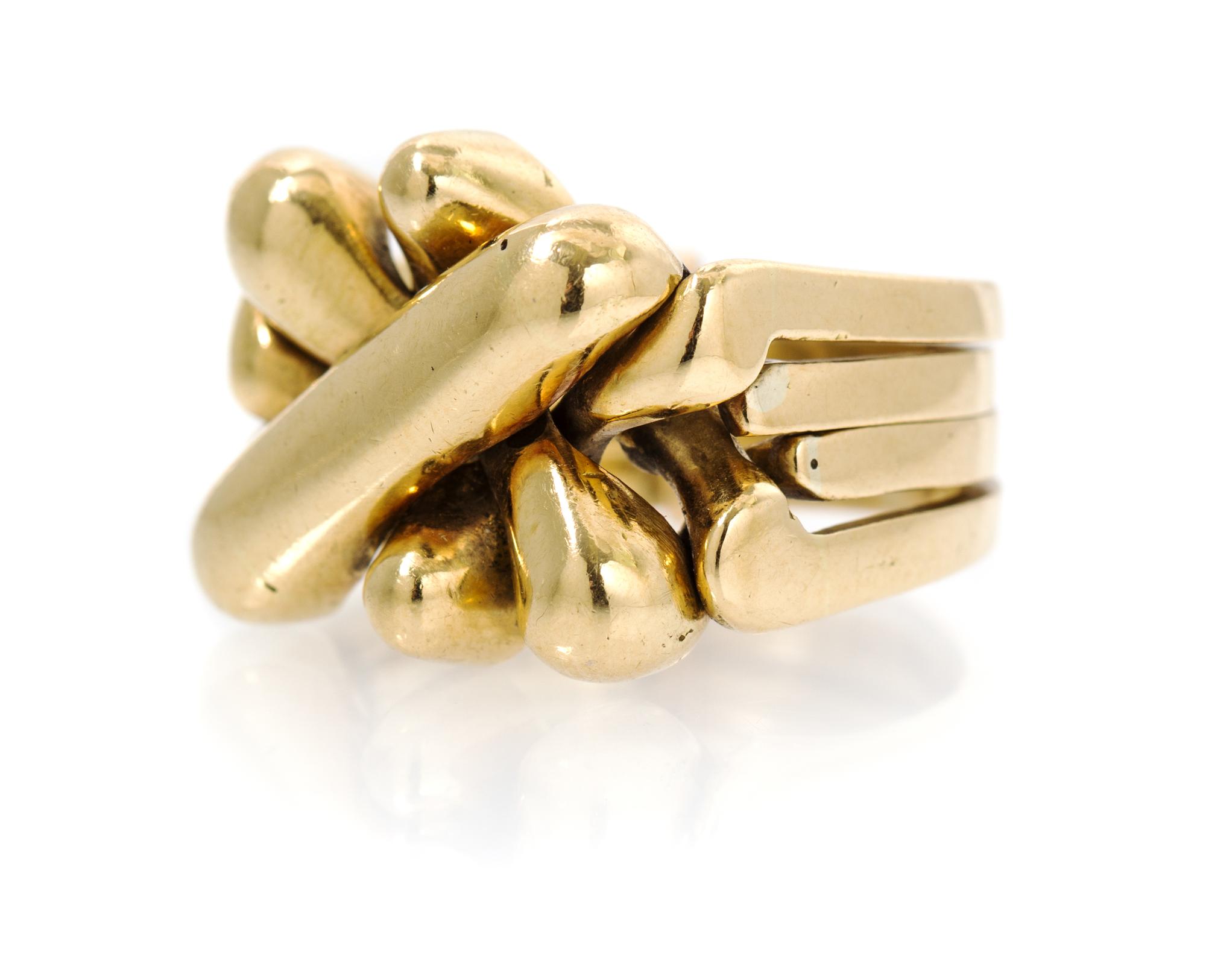 An 18 Karat Yellow Gold Puzzle Ring, 14.60 dwts.