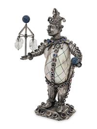 A German Silver and Jewel-Mounted Shell Figure of a Jester