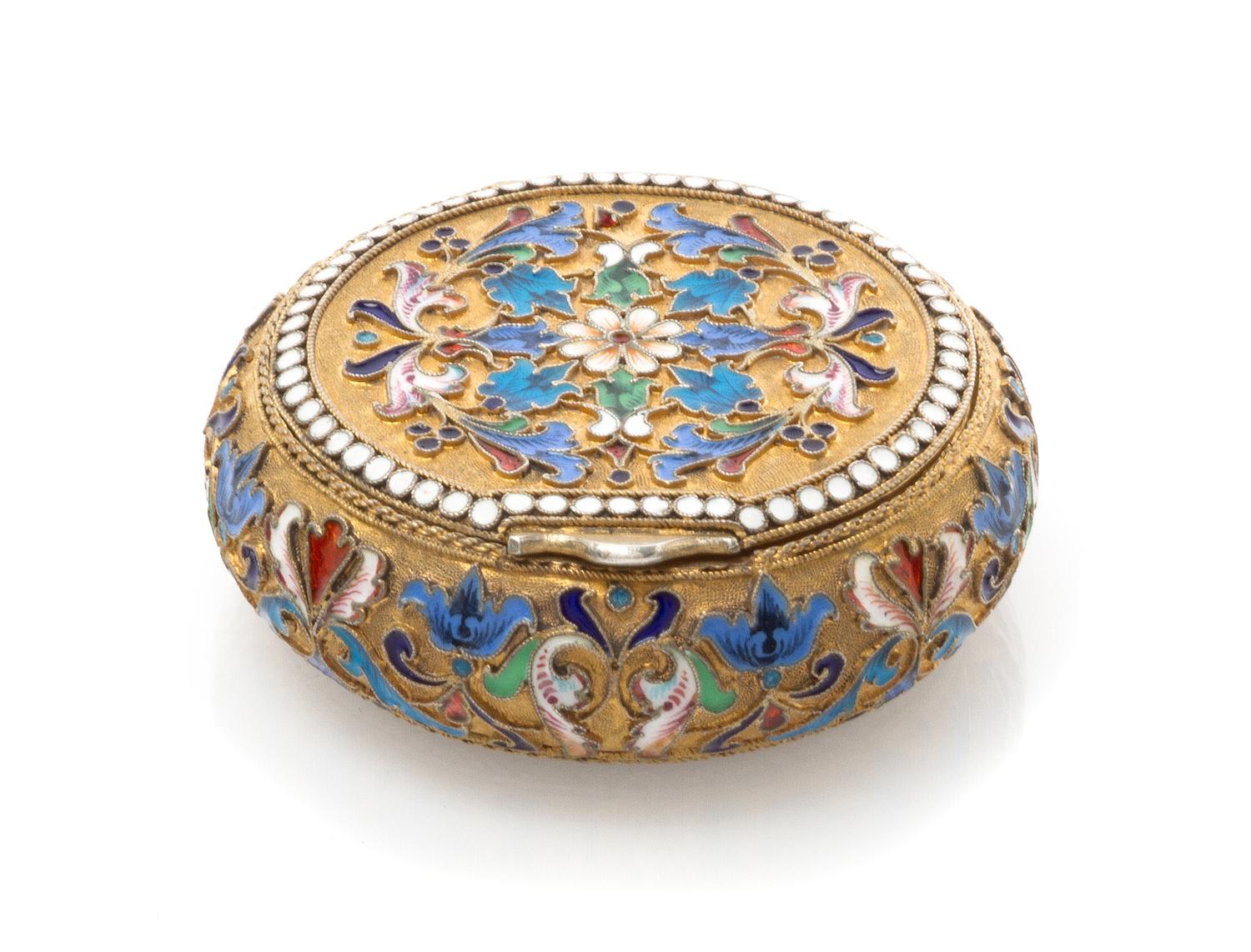 A Russian Silver and Enamel Snuff Box, Mark of Ivan Saltykov, assay mark of Anatoly Artsybashev, Moscow, 1895, of circular form, having