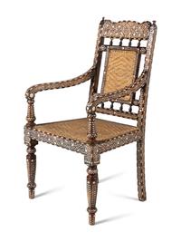 A Pair of Vizagapatam Style Bone Inlaid Hardwood Chairs