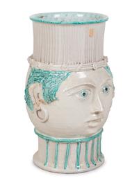A Glazed Ceramic Figural Floor Vase