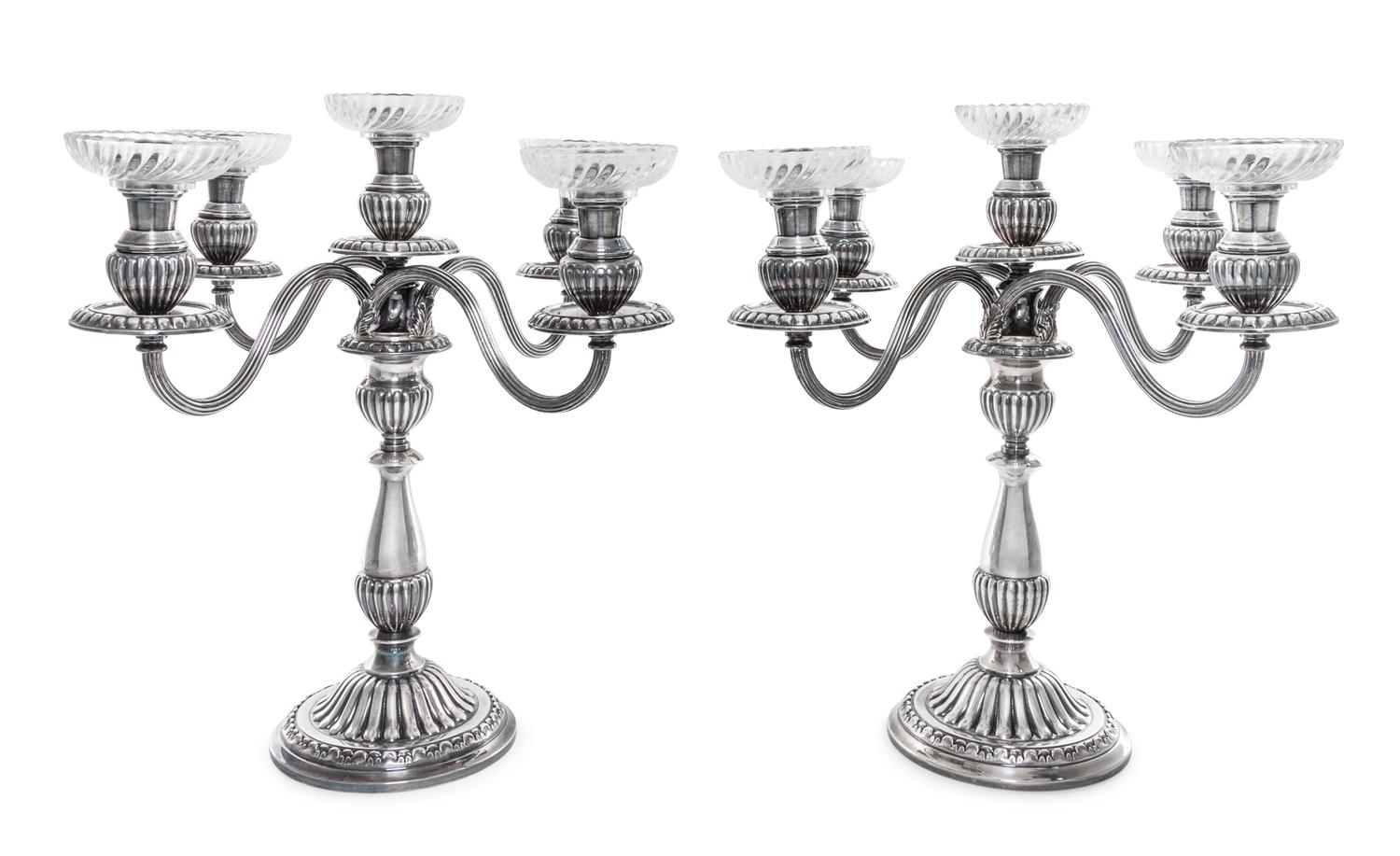 A Pair of Peruvian Silver Five-Light Candelabra, Camusso, Lima, Mid 20th Century, the circular bases lobed and rising to confirming bal
