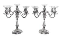 A Pair of Peruvian Silver Five-Light Candelabra, Camusso, Lima, Mid 20th Century, the circular bases lobed and rising to confirming bal