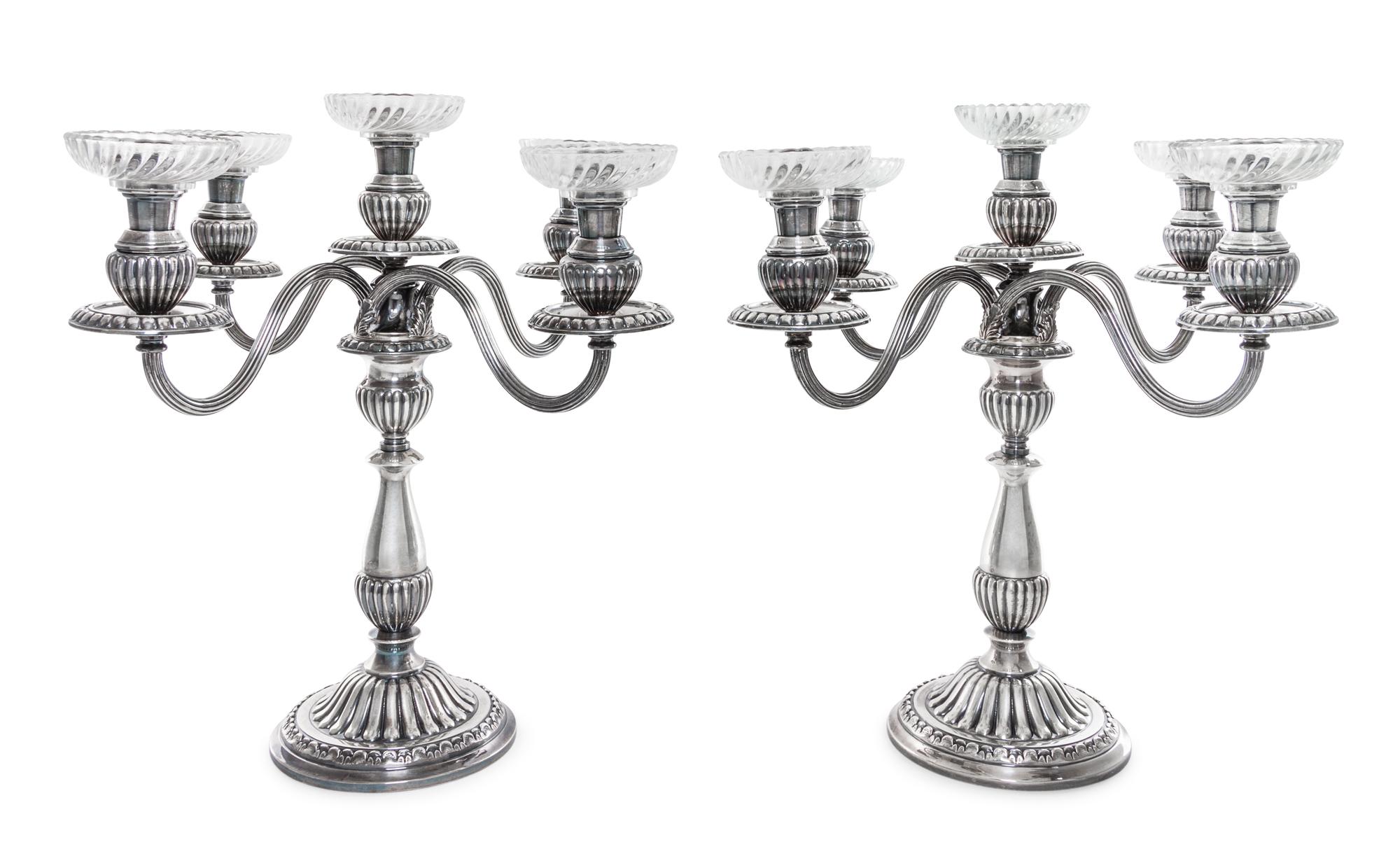 A Pair of Peruvian Silver Five-Light Candelabra, Camusso, Lima, Mid 20th Century, the circular bases lobed and rising to confirming bal
