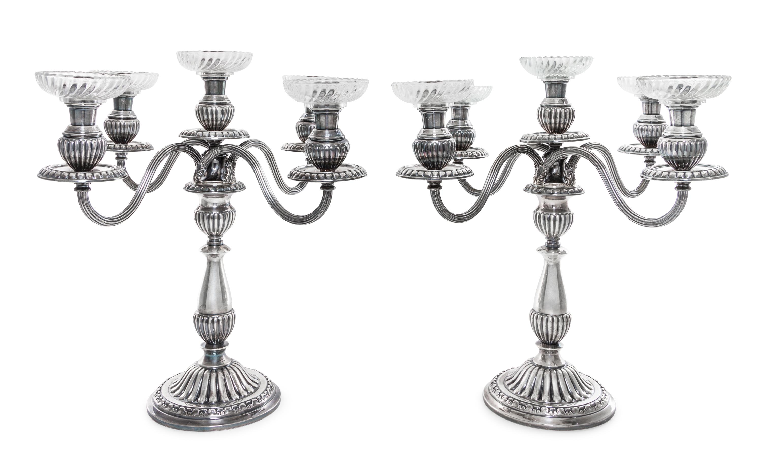 A Pair of Peruvian Silver Five-Light Candelabra, Camusso, Lima, Mid 20th Century, the circular bases lobed and rising to confirming bal
