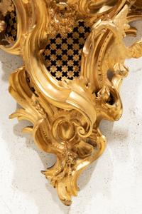 A Louis XV Gilt Bronze Cartel Clock