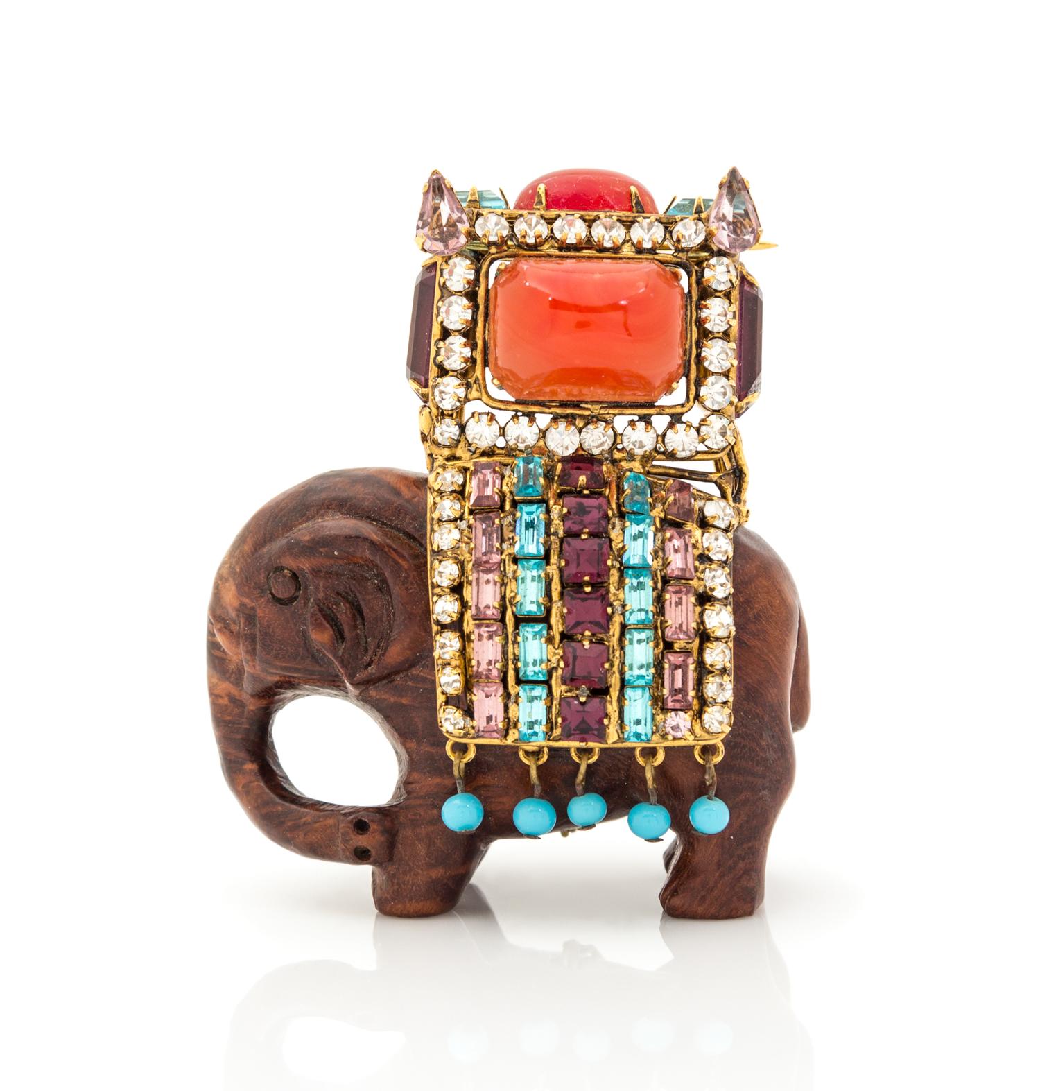 An Iradj Moini Wood Elephant Brooch, 2.5" x 3" x 1.5".