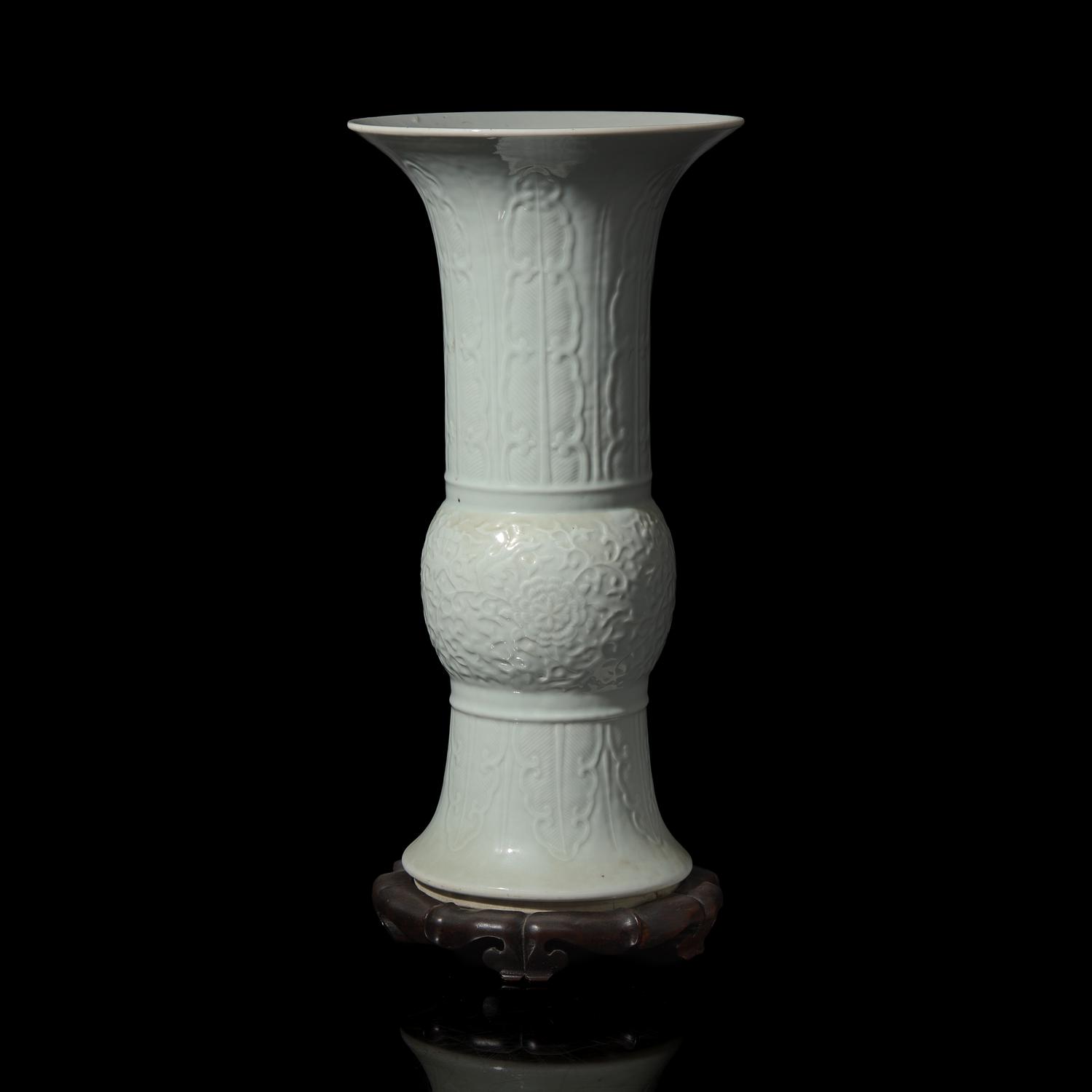 A Chinese Blanc-de-Chine Gu -Form Vase, Late Qing-Republic Period — 晚清-民國 德化窯模印花卉紋觚