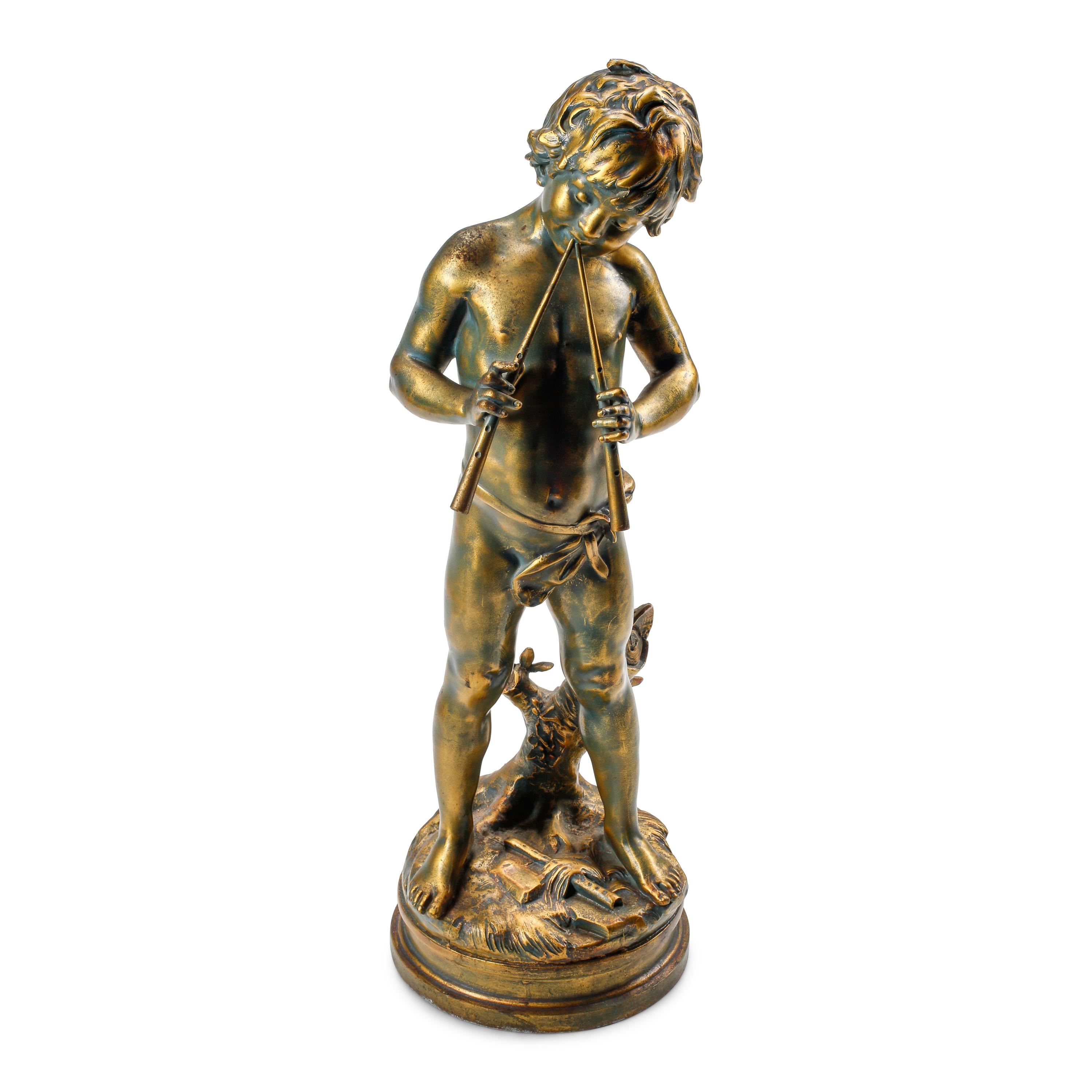 A French Gilt Metal Figure of a Flute Player